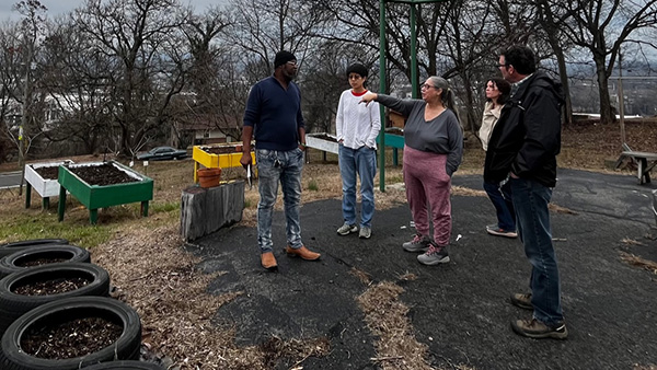 Planning for the urban monitoring installation at the Socially Equal Energy Efficient Development (SEEEDknox.org). (Image credit: Melanie Mayes, ORNL)