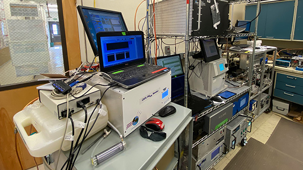 Center for Aerosol-gas Forensic Experiments (CAFE) field measurements and analyses are integrated to develop models of aerosol and carbon cycle behavior as well as monitor decarbonization trends that impact climate, air quality and human health. (Image credit: Los Alamos National Laboratory)
